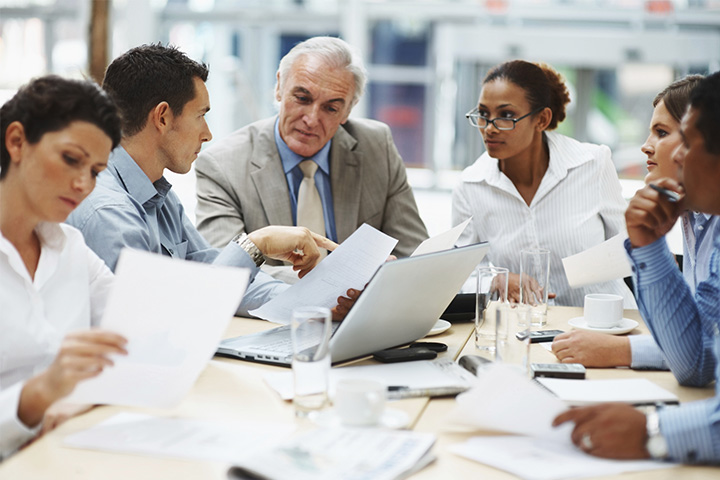 Group reviewing paperwork together